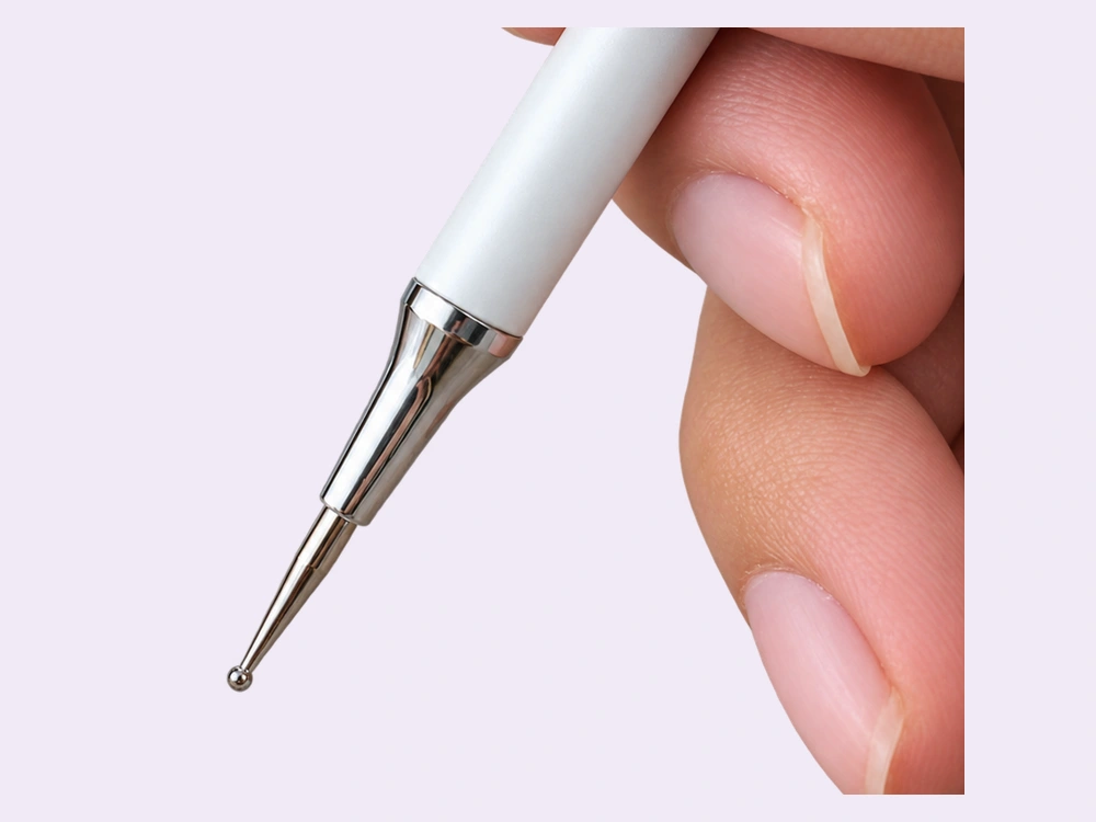 Close view of the bare fine round metal tip