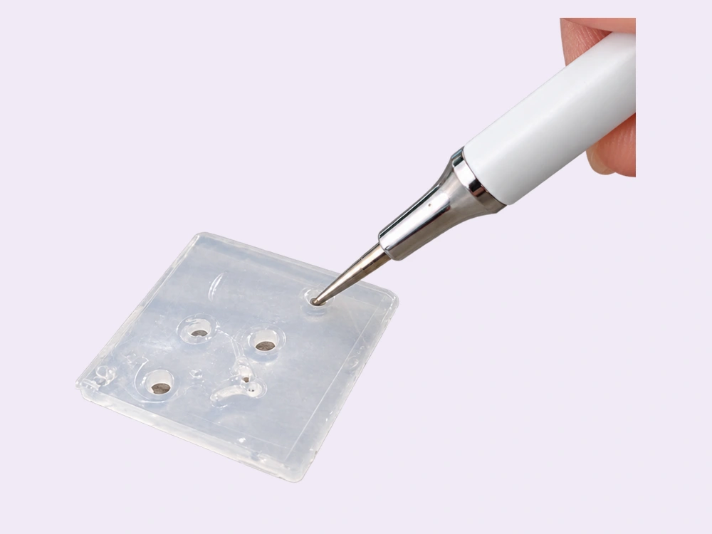 Fine tip pressed into silicone putty
